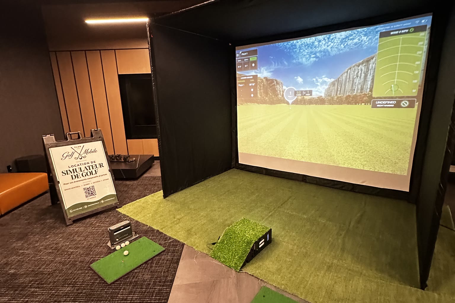 Golf Club Mobile simulator installed in an indoor event space